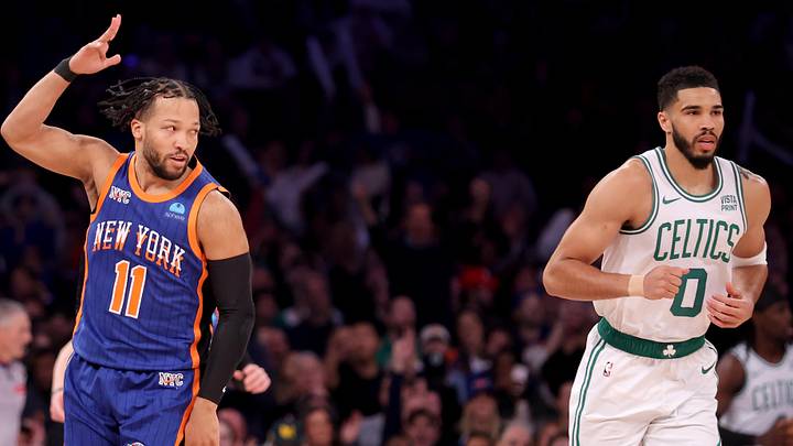 Feb 24, 2024; New York, New York, USA; New York Knicks guard Jalen Brunson (11) celebrates his three point shot against Boston Celtics forward Jayson Tatum (0) during the first quarter at Madison Square Garden. Mandatory Credit: Brad Penner-Imagn Images