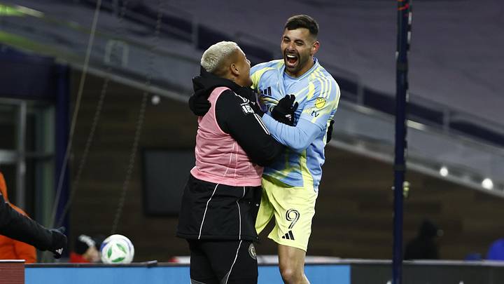 Mar 8, 2025; Foxborough, Massachusetts, USA; Philadelphia Union forward Tai Baribo (9) jumps into a teammates arms after scoring against the New England Revolution during the second half at Gillette Stadium. Mandatory Credit: Winslow Townson-Imagn Images