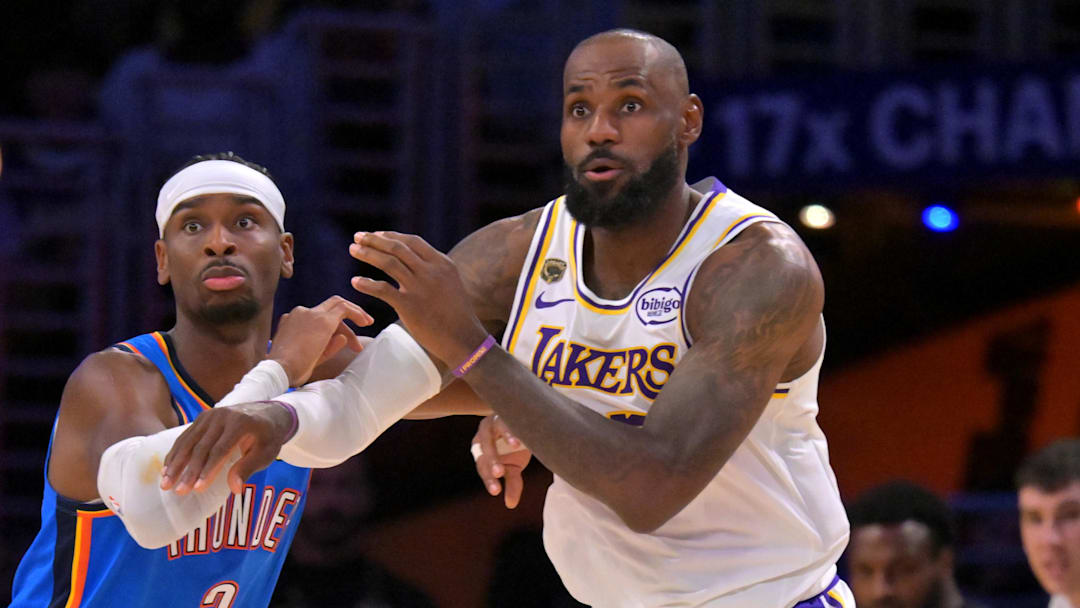May 9, 2026; Los Angeles, California, USA; Oklahoma City Thunder guard Shai Gilgeous-Alexander (2) defends Los Angeles Lakers forward LeBron James (23) in the second half of game three of the second round of the 2026 NBA Playoffs at Crypto.com Arena. Mandatory Credit: Jayne Kamin-Oncea-Imagn Images