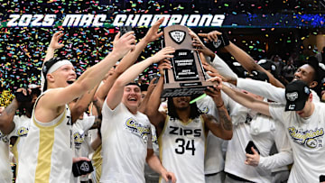 Mar 15, 2025; Cleveland, OH, USA;  The Akron Zips celebrate after winning the MAC Conference Tournament Championship game against the Miami (Oh) Redhawks at Rocket Arena. Mandatory Credit: Ken Blaze-Imagn Images