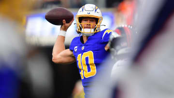 Dec 10, 2023; Inglewood, California, USA; Los Angeles Chargers quarterback Justin Herbert (10) throws against the Denver Broncos during the first half at SoFi Stadium. Mandatory Credit: Gary A. Vasquez-USA TODAY Sports