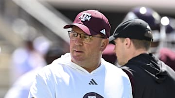Sep 27, 2025; College Station, Texas, USA; Texas A&M Aggies head coach Mike Elko walks on the field prior to the game against the Auburn Tigers at Kyle Field. Mandatory Credit: Maria Lysaker-Imagn Images 