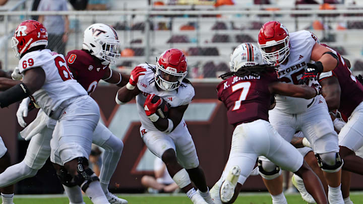 Sep 21, 2024; Blacksburg, Virginia, USA; Rutgers Scarlet Knights running back Kyle Monangai (5) runs the ball during the second quarter against the Virginia Tech Hokies at Lane Stadium. Mandatory Credit: Peter Casey-Imagn Images