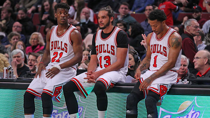 Chicago Bulls guard Jimmy Butler (21), center Joakim Noah (13), and guard Derrick Rose (1) during the second half against the Phoenix Suns at the United Center. 