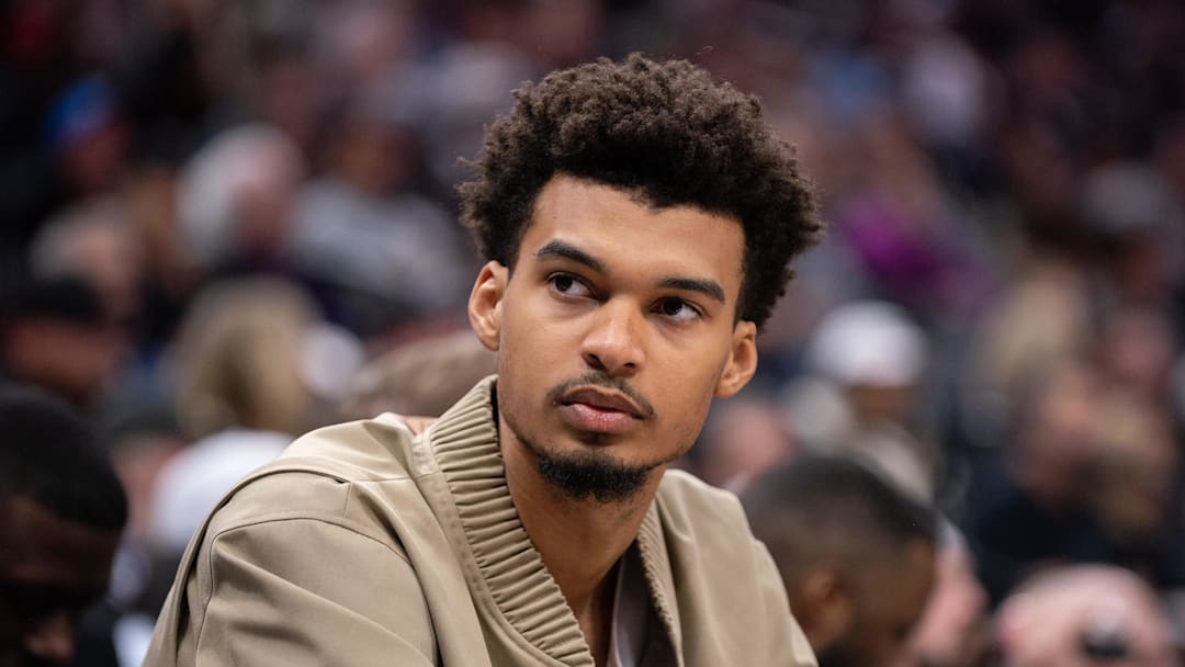 Mar 7, 2025; Sacramento, California, USA; San Antonio Spurs center Victor Wembanyama (1) looks on from the bench during the fourth quarter of the game against the Sacramento Kings at Golden 1 Center. Mandatory Credit: Ed Szczepanski-Imagn Images