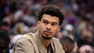 Mar 7, 2025; Sacramento, California, USA; San Antonio Spurs center Victor Wembanyama (1) looks on from the bench during the fourth quarter of the game against the Sacramento Kings at Golden 1 Center. Mandatory Credit: Ed Szczepanski-Imagn Images