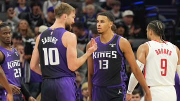 Mar 10, 2024; Sacramento, California, USA; Sacramento Kings forward Domantas Sabonis (10) talks with forward Keegan Murray (13) during the third quarter against the Houston Rockets at Golden 1 Center. Mandatory Credit: Darren Yamashita-USA TODAY Sports