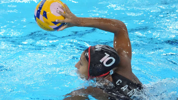 Canada centre back Serena Browne (10) in action against Hungary in a women's water polo group play