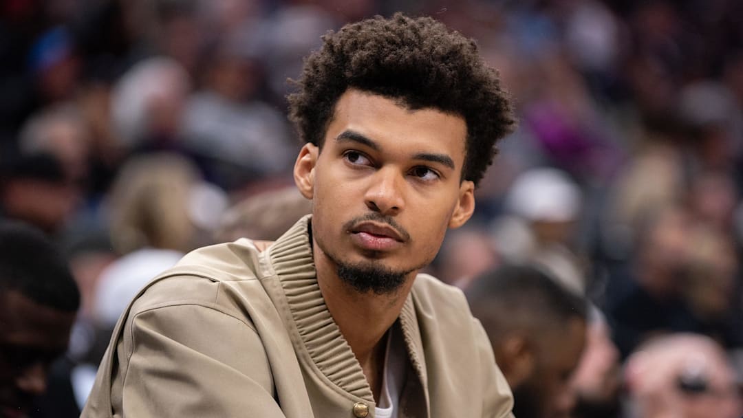 Mar 7, 2025; Sacramento, California, USA; San Antonio Spurs center Victor Wembanyama (1) looks on from the bench during the fourth quarter of the game against the Sacramento Kings at Golden 1 Center. Mandatory Credit: Ed Szczepanski-Imagn Images