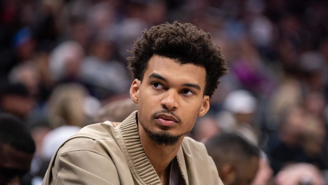 Mar 7, 2025; Sacramento, California, USA; San Antonio Spurs center Victor Wembanyama (1) looks on from the bench during the fourth quarter of the game against the Sacramento Kings at Golden 1 Center. Mandatory Credit: Ed Szczepanski-Imagn Images