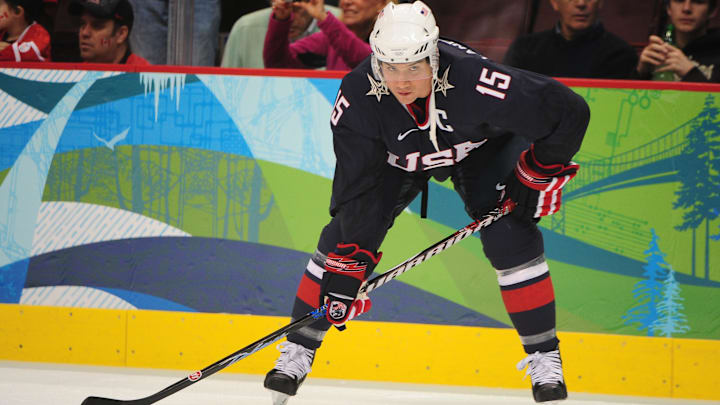 February 16, 2010; Vancouver, BC, CANADA; USA forward Jamie Langenbrunner (15) stretches before the game in the preliminary round of group A play of the 2010 Vancouver Olympics against Switzerland at the Canada Hockey Place. Mandatory Credit: Kyle Terada-Imagn Images
