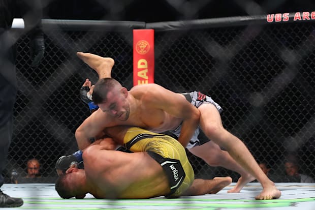 Bill Algeo fights Herbert Burns during UFC Fight Night at UBS Arena. 