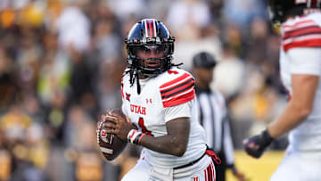 Utah Utes quarterback Devon Dampier (4) during the first quarter against the Wyoming Cowboys at Jonah Field at War Memorial Stadium. Credit: Ron Chenoy-Imagn Images