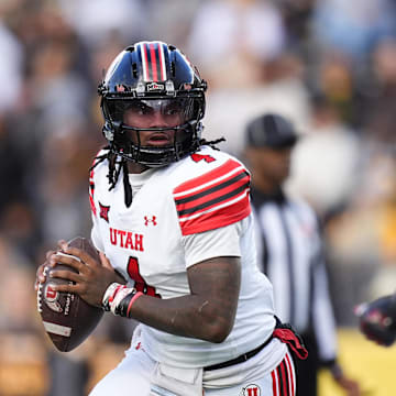 Utah Utes quarterback Devon Dampier (4) during the first quarter against the Wyoming Cowboys at Jonah Field at War Memorial Stadium. Credit: Ron Chenoy-Imagn Images
