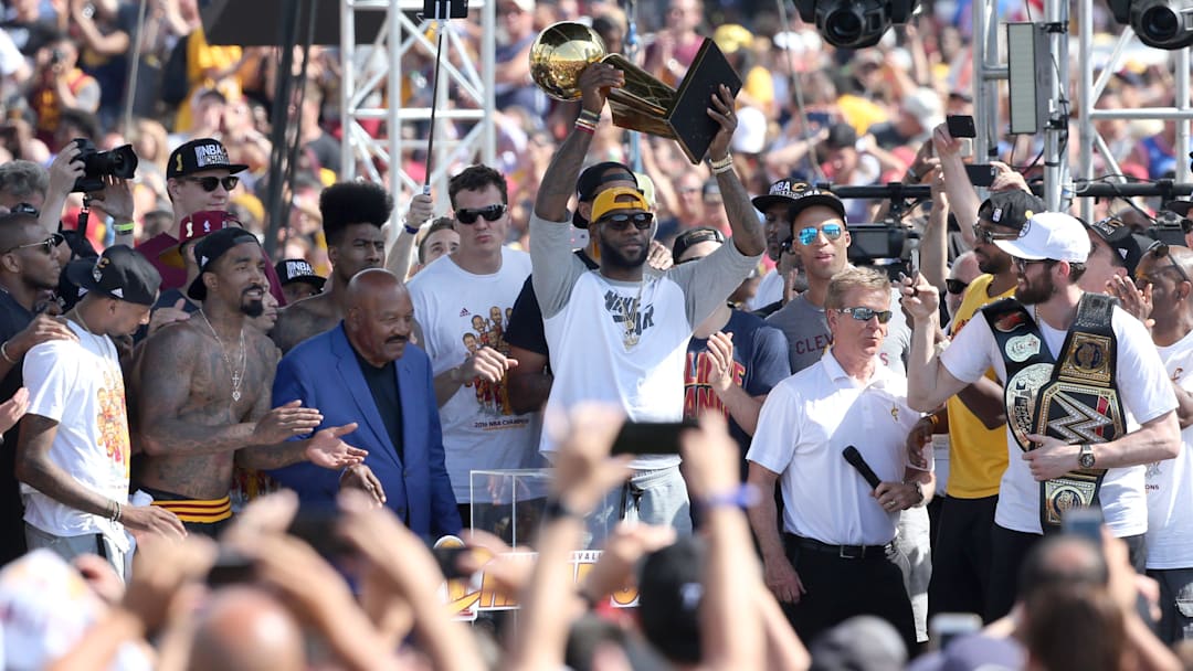 LeBron James raised the Larry O'Brien Trophy with Jim Brown by his side at the  rally following the Cavaliers Championship Parade in Cleveland on Tuesday, June 21, 2016.

Meet Canton Repository Photographer Scott Heckel 15