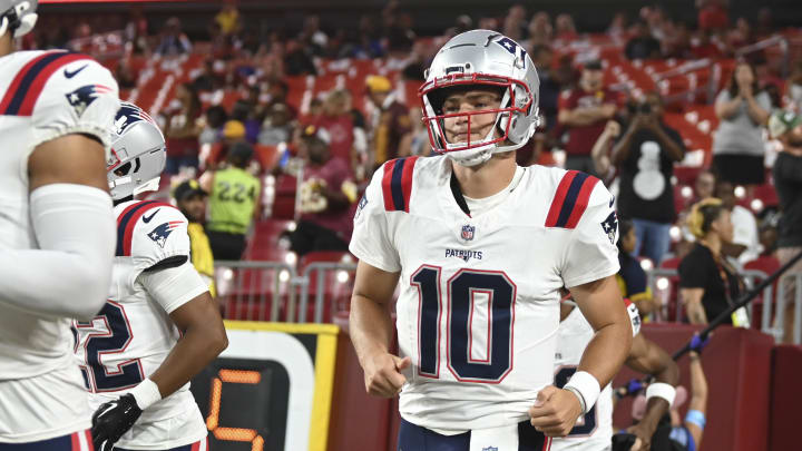 Aug 25, 2024; Landover, Maryland, USA;  New England Patriots quarterback Drake Maye (10) takes the field before the game against the Washington Commanders at Commanders Field. Mandatory Credit: Tommy Gilligan-USA TODAY Sports