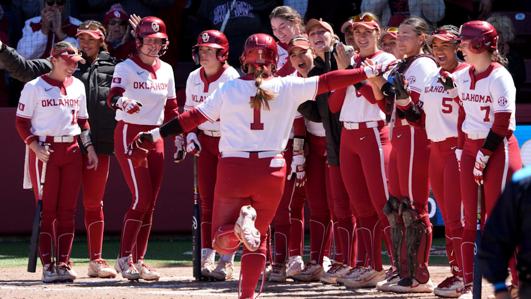 Oklahoma's Kendall Wells (1) sits at the top of the NCAA home run leader board with 34 in her rookie campaign. 