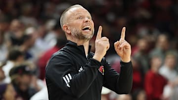 Dec 3, 2025; Fayetteville, Arkansas, USA;  Louisville Cardinals head coach Pat Kelsey during the first half against the Arkansas Razorbacks at Bud Walton Arena. Mandatory Credit: Nelson Chenault-Imagn Images
