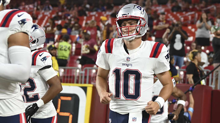 Aug 25, 2024; Landover, Maryland, USA;  New England Patriots quarterback Drake Maye (10) takes the field before the game against the Washington Commanders at Commanders Field. Mandatory Credit: Tommy Gilligan-USA TODAY Sports