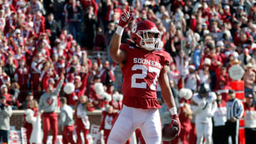 Oklahoma Sooners running back Gavin Sawchuk (27) celebrates after a touchdown during a college football game between the University of Oklahoma Sooners (OU) and the TCU Horned Frogs at Gaylord Family-Oklahoma Memorial Stadium in Norman, Okla., Friday, Nov. 24, 2023. Oklahoma won 69-45.