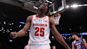Mar 22, 2024; Brooklyn, NY, USA; Wisconsin Badgers guard John Blackwell (25) reacts against the James Madison Dukes in the first round of the 2024 NCAA Tournament at the Barclays Center. Mandatory Credit: Brad Penner-Imagn Images