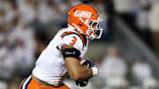 Sep 28, 2024; University Park, Pennsylvania, USA; Illinois Fighting Illini running back Kaden Feagin (3) runs during the second quarter against the Penn State Nittany Lions at Beaver Stadium. Mandatory Credit: Matthew O'Haren-Imagn Images