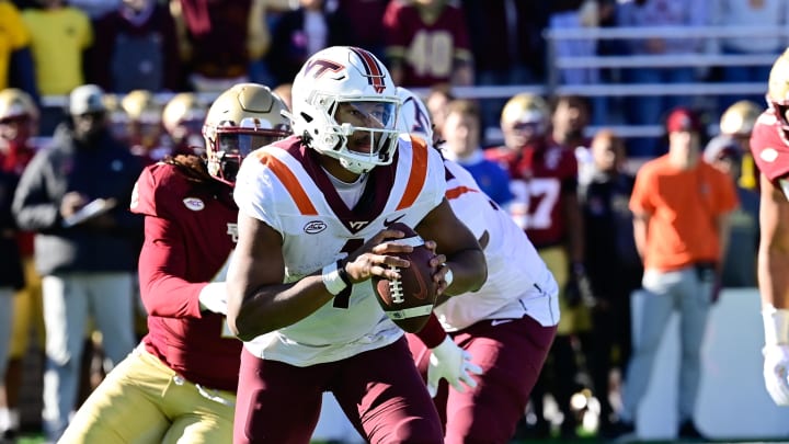 Nov 11, 2023; Chestnut Hill, Massachusetts, USA; Virginia Tech Hokies quarterback Kyron Drones (1) against the Boston College Eagles  during the first half at Alumni Stadium. Mandatory Credit: Eric Canha-USA TODAY Sports