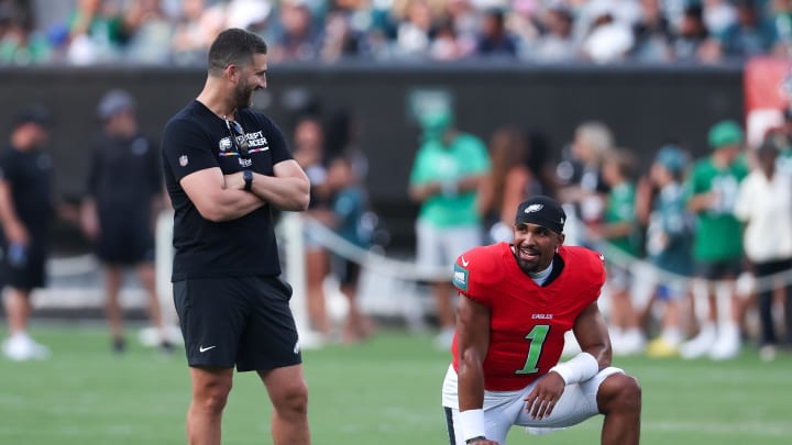 Aug 1, 2024; Philadelphia, PA, USA; Philadelphia Eagles quarterback Jalen Hurts (1) talks with head coach Nick Sirianni (L) during a practice at Lincoln Financial Field. Mandatory Credit: Bill Streicher-USA TODAY Sports