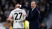 Massimiliano Allegri (R), head coach of Juventus FC, hugs...