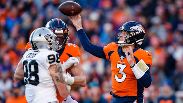 Denver Broncos quarterback Drew Lock (3) attempts a pass vs. the Oakland Raiders.
