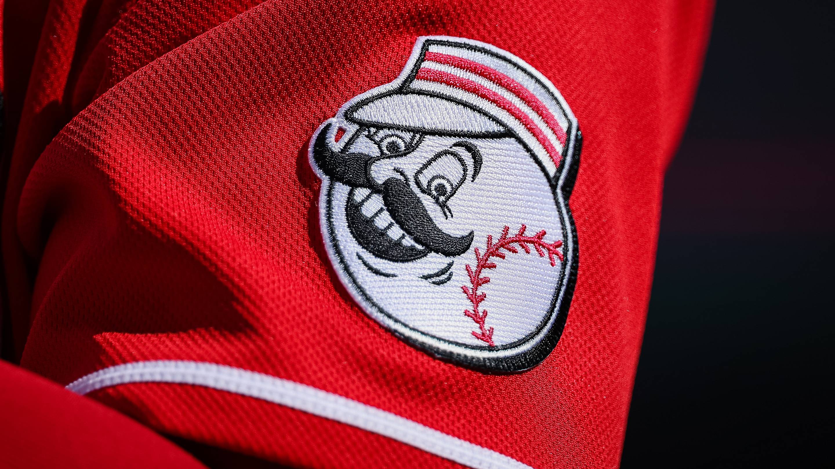 Aug 28, 2022; Washington, District of Columbia, USA; A detailed view of the Cincinnati Reds jersey logo during the ninth inning of the game between the Washington Nationals and the Cincinnati Reds at Nationals Park. Mandatory Credit: Scott Taetsch-USA TODAY Sports