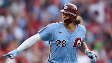Aug 15, 2024; Philadelphia, Pennsylvania, USA; Philadelphia Phillies third base Alec Bohm (28) reacts after hitting a three RBI home run during the first inning against the Washington Nationals at Citizens Bank Park. Mandatory Credit: Bill Streicher-Imagn Images