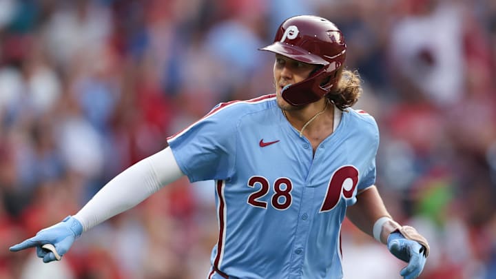 Aug 15, 2024; Philadelphia, Pennsylvania, USA; Philadelphia Phillies third base Alec Bohm (28) reacts after hitting a three RBI home run during the first inning against the Washington Nationals at Citizens Bank Park. Mandatory Credit: Bill Streicher-Imagn Images