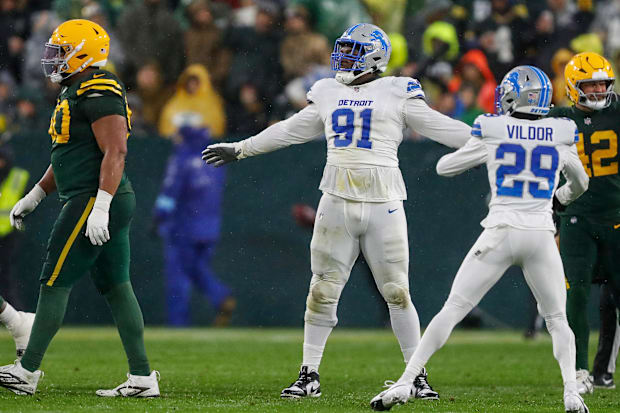 Detroit Lions defensive end Levi Onwuzurike (91) celebrates after a missed field goal attempt by the Green Bay Packers