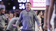 Jan 11, 2025; Athens, Georgia, USA; Georgia Bulldogs head coach Mike White reacts on the bench against the Oklahoma Sooners during the second half at Stegeman Coliseum. Mandatory Credit: Dale Zanine-Imagn Images