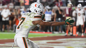 Oct 4, 2025; Tallahassee, Florida, USA; Miami Hurricanes wide receiver CJ Daniels (7) celebrates after a touchdown during the first half against the Florida State Seminoles at Doak S. Campbell Stadium. Mandatory Credit: Robert Myers-Imagn Images