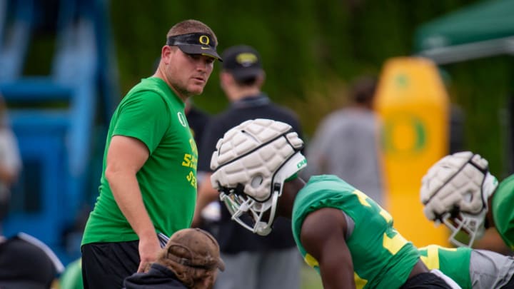 Oregon defensive coordinator Tosh Lupoi watches over practice with the Ducks Wednesday, Aug. 17, 2022, in Eugene, Ore.

Lupoi