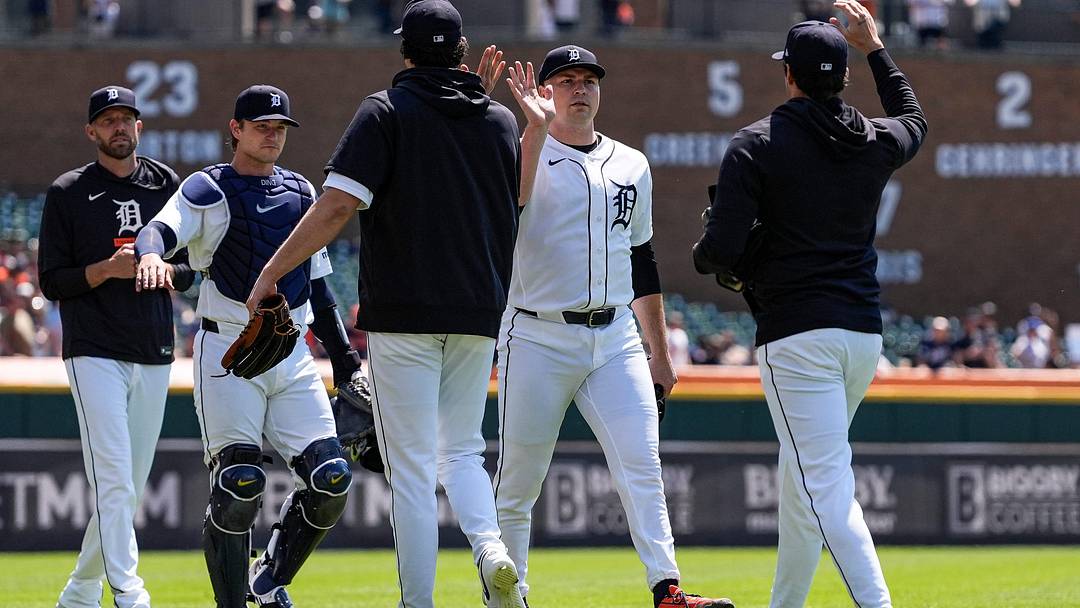 Detroit Tigers pitcher Tarik Skubal (29) high-fives teammates after warm up before first pitch against Milwaukee Brewers at Comerica Park in Detroit on Thursday, April 23, 2026.