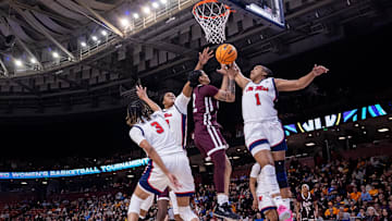 Mar 6, 2025; Greenville, SC, USA; Ole Miss Rebels guard KK Deans (1) blocks a shot from Mississippi State Bulldogs guard Jerkaila Jordan (2) during the first half at Bon Secours Wellness Arena. Mandatory Credit: Scott Kinser-Imagn Images