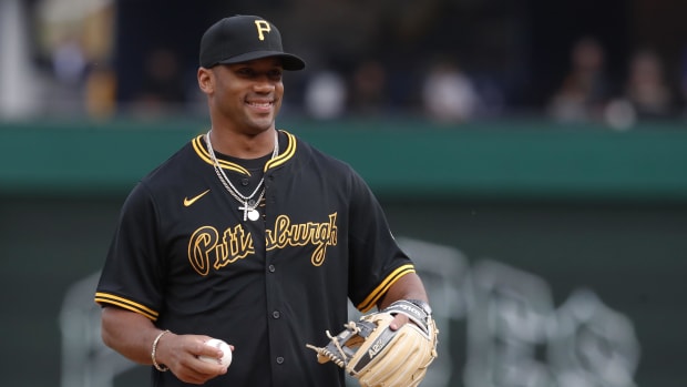 Pittsburgh Steelers quarterback Russell Wilson (3) throws out a ceremonial first pitch with the Pittsburgh Pirates 