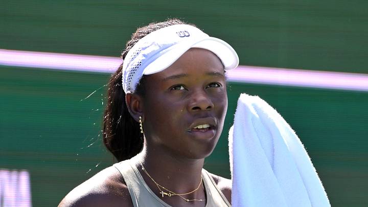 Victoria Mboko wipes her face