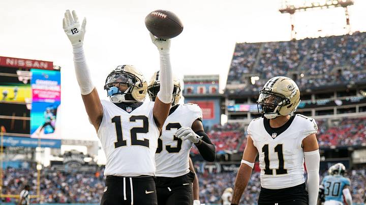 New Orleans Saints wide receiver Chris Olave (12) celebrates his touchdown against the Tennessee Titans during the third quarter at Nissan Stadium in Nashville, Tenn., Sunday, Dec. 28, 2025.