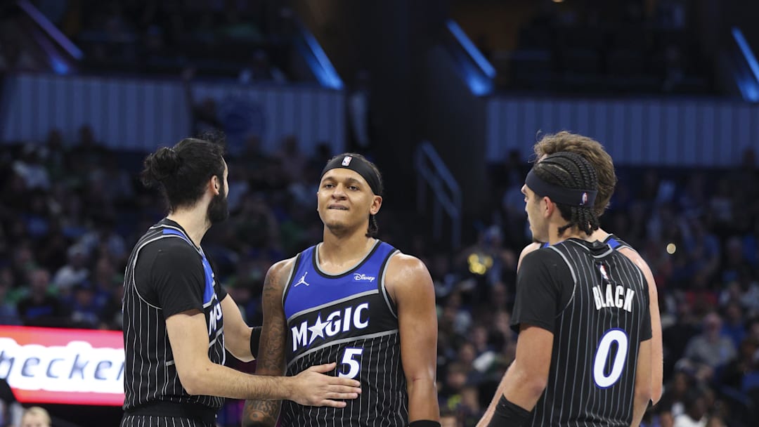 Nov 7, 2025; Orlando, Florida, USA; Orlando Magic forward Paolo Banchero (5) reacts after a play against the Boston Celtics in the fourth quarter at Kia Center. Mandatory Credit: Nathan Ray Seebeck-Imagn Images