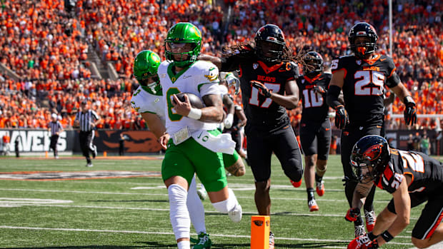 Oregon quarterback Dillon Gabriel runs for a touchdown as the Oregon State Beavers host the Oregon Ducks Saturday, Sept. 14, 