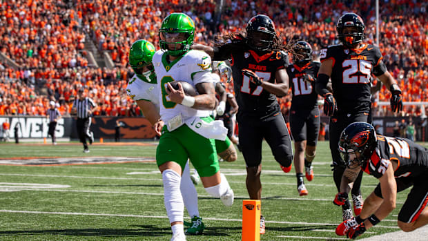 Oregon quarterback Dillon Gabriel runs for a touchdown as the Oregon State Beavers host the Oregon Ducks Saturday, Sept. 14