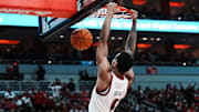 Louisville forward Khani Rooths (9) dunks against California during their game at the KFC Yum! Center in Louisville, Ky. on Mar. 5, 2025.
