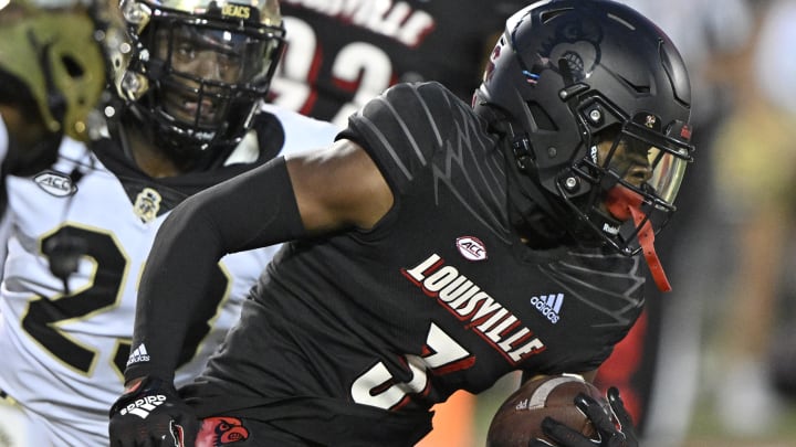 Oct 29, 2022; Louisville, Kentucky, USA;  Louisville Cardinals cornerback Quincy Riley (3) returns an interception against the Wake Forest Demon Deacons during the second half at Cardinal Stadium.