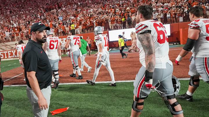 Ohio State Buckeyes head coach Ryan Day watches his players leave the field following the NCAA football game against the Texas Longhorns at Darrell K Royal–Texas Memorial Stadium in Austin, Texas on Sept. 12, 2026. Texas won 24-23.