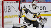 Dec 23, 2023; Sunrise, Florida, USA; Vegas Golden Knights goaltender Jiri Patera (30) watches the puck go wide against the Florida Panthers during the second period at Amerant Bank Arena. Mandatory Credit: Sam Navarro-Imagn Images