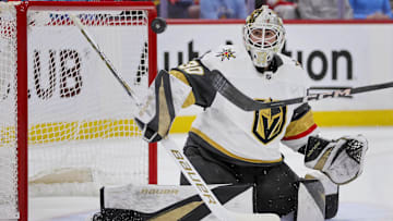 Dec 23, 2023; Sunrise, Florida, USA; Vegas Golden Knights goaltender Jiri Patera (30) watches the puck go wide against the Florida Panthers during the second period at Amerant Bank Arena. Mandatory Credit: Sam Navarro-Imagn Images